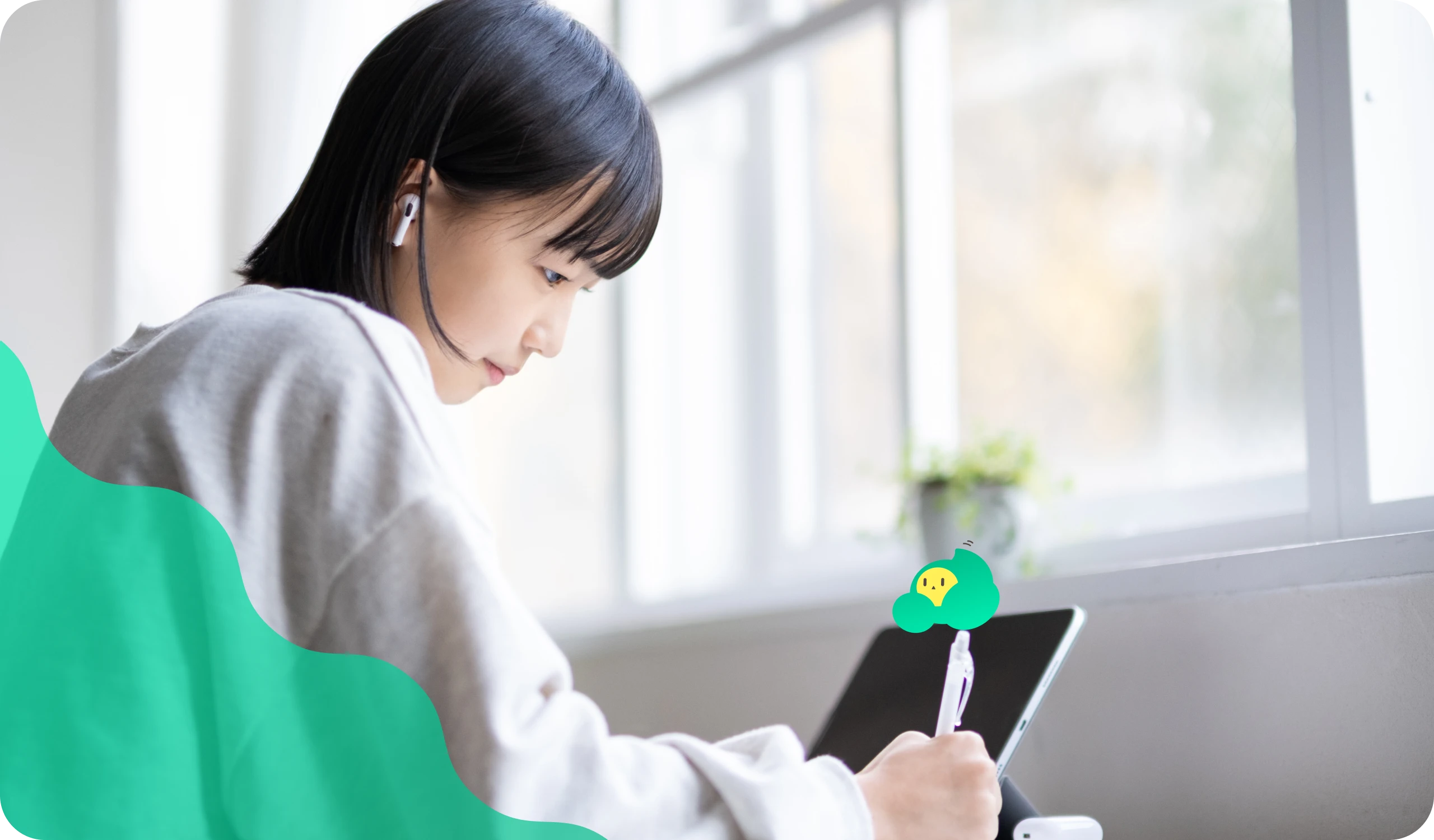 タブレットで勉強する中学生