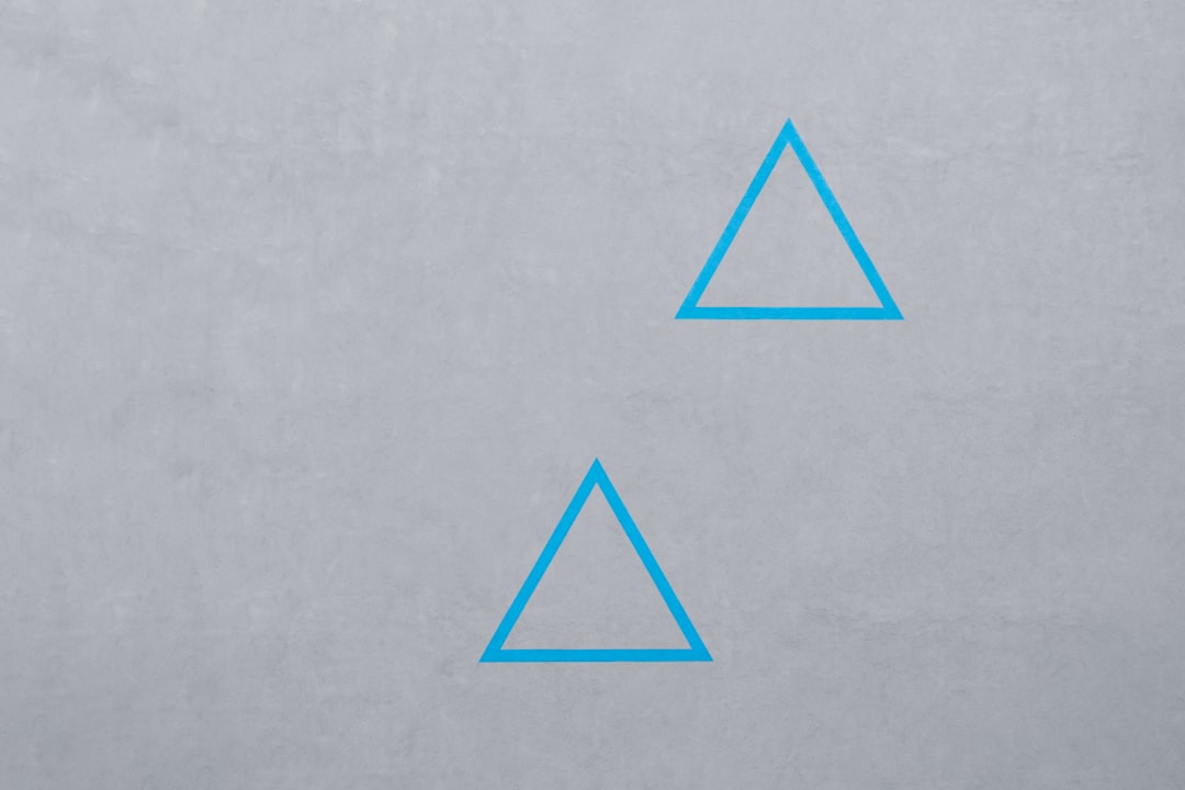 two blue triangle logos