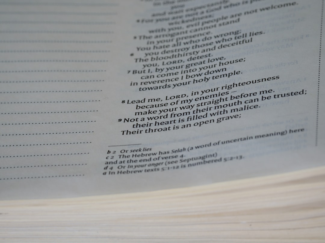 a close up of a book with a poem on it